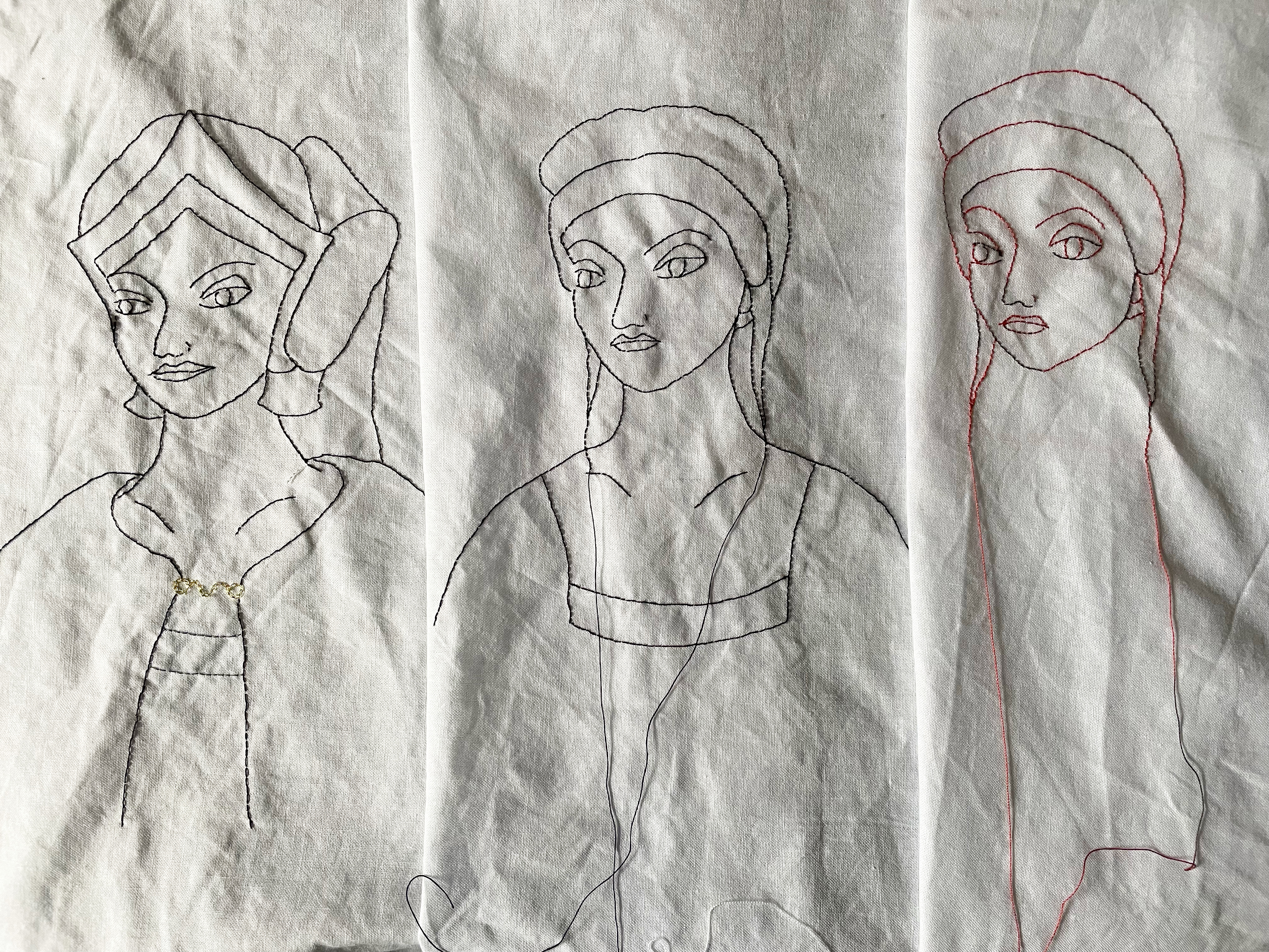 Three heads of a woman, wearing firstly a gable hood, secondly a cap, thirdly a head alone wearing a cap.